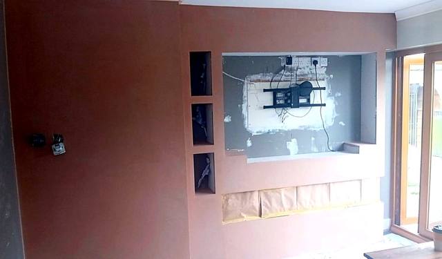 Media wall with three shelf niches and a TV recess in the West Midlands