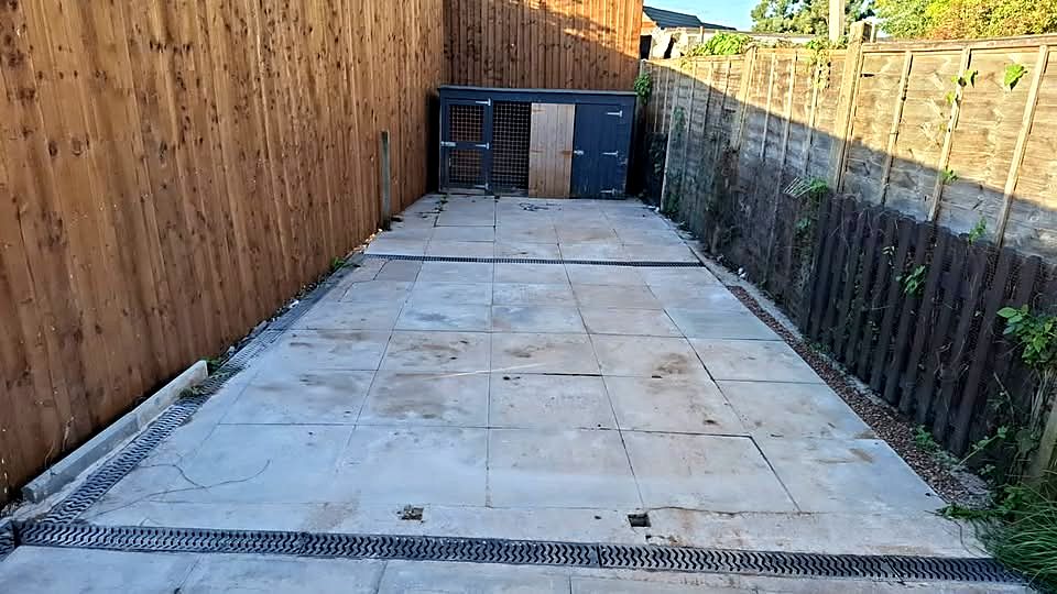 Finished level patio with two ACO channel drains in Northfield