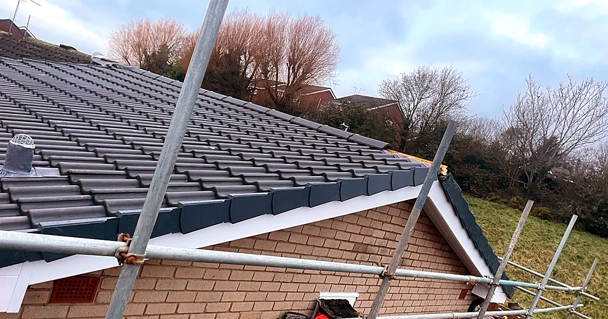 New roof tiles with new white fascias and soffits