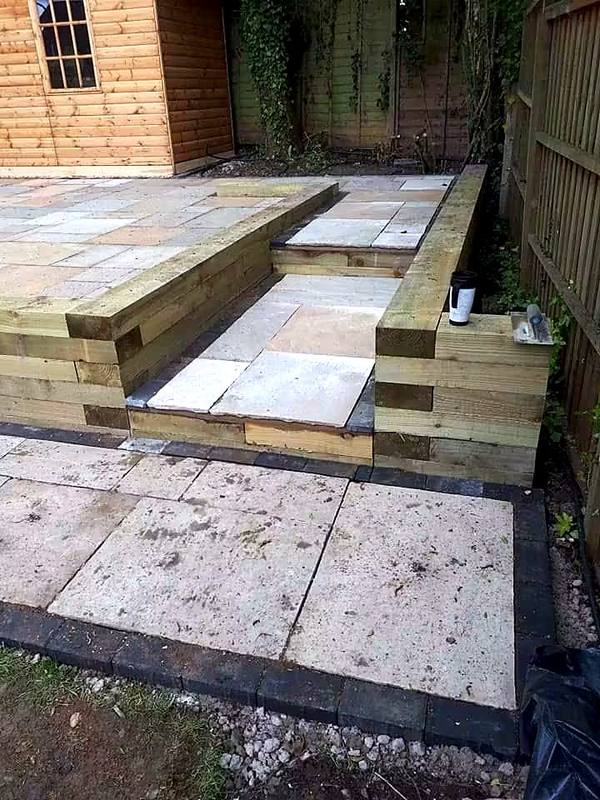 Timber sleeper raised beds either side of sandstone steps in the Wolverhampton area
